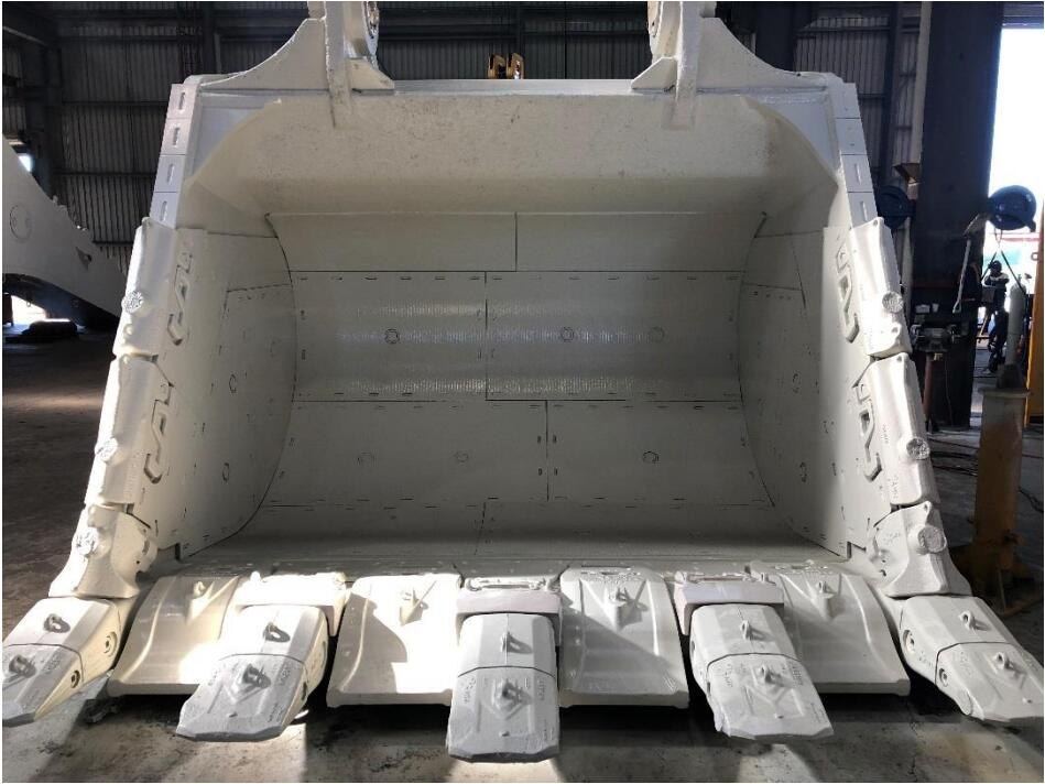 Wear liners installed in a mining shovel bucket