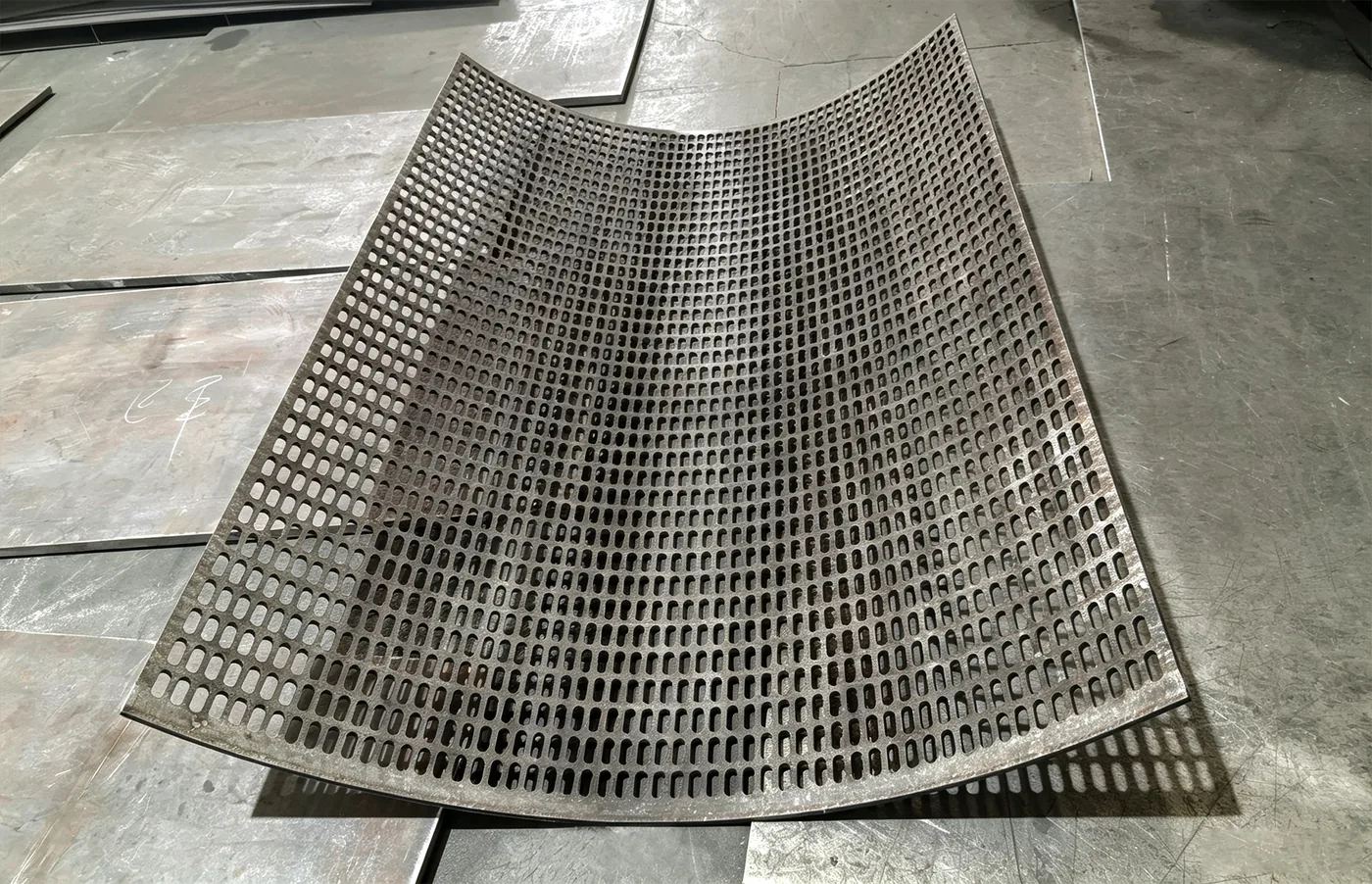 Fabricated perforated overlay screen panel