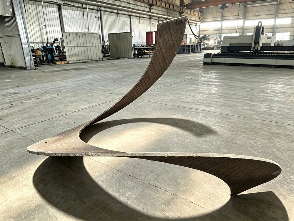 Rolled and formed overlay wear part